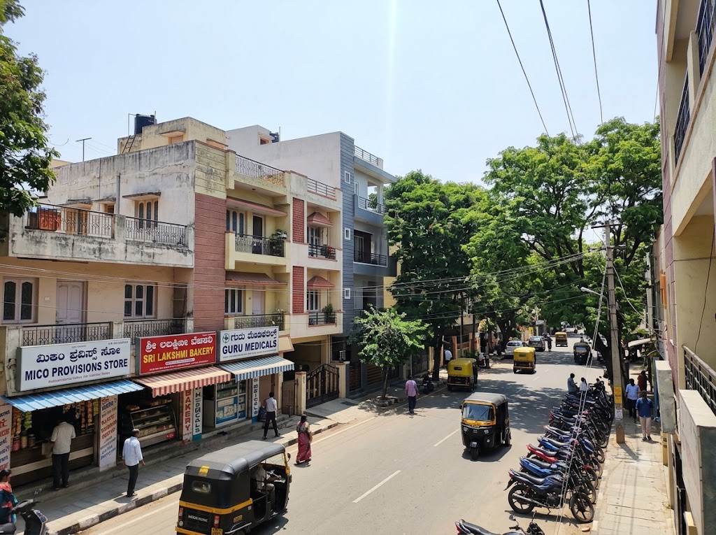 MICO Layout road view with office buildings in BTM Bangalore